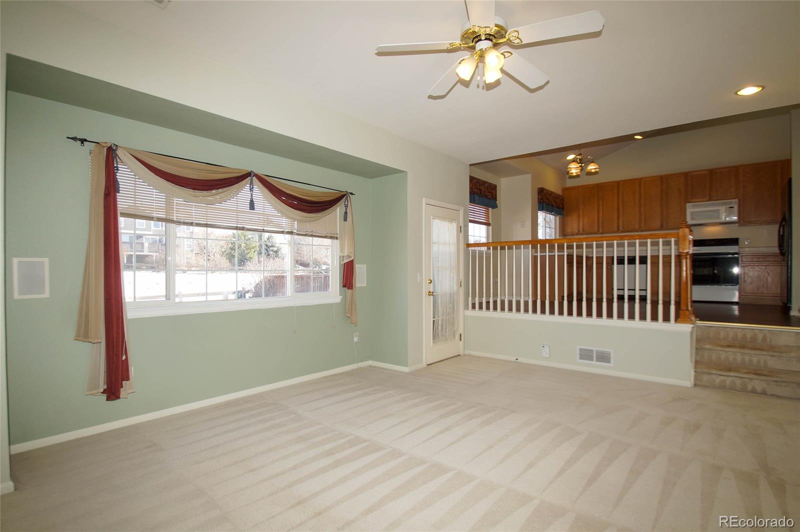9638 Silverberry Circle Highlands Ranch, CO 80129 - Photo 10 of 27 an empty room with windows