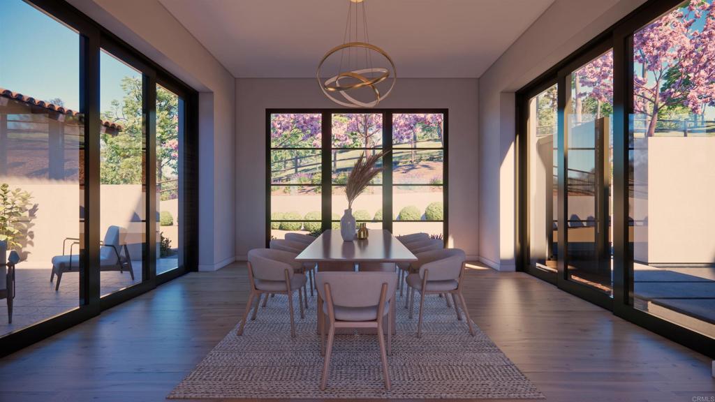 5501 Paseo Del Alba Rancho Santa Fe, CA 92067 - Photo 4 of 8 a view of a dining room with furniture and wooden floor