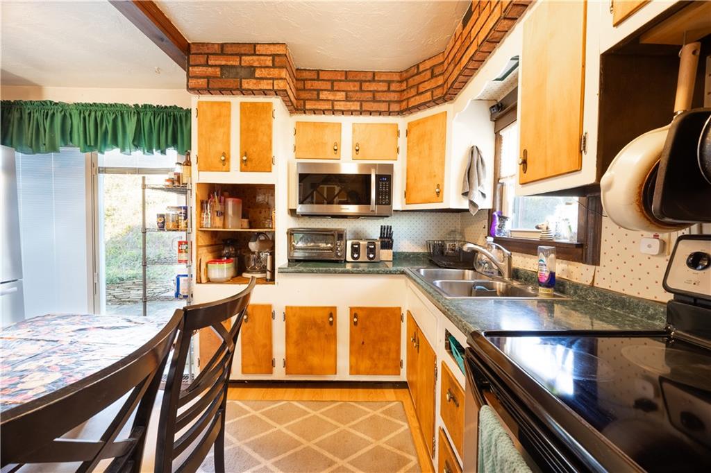 1631 Elderslee Road Pittsburgh, PA 15227 - Photo 5 of 31 Another kitchen view