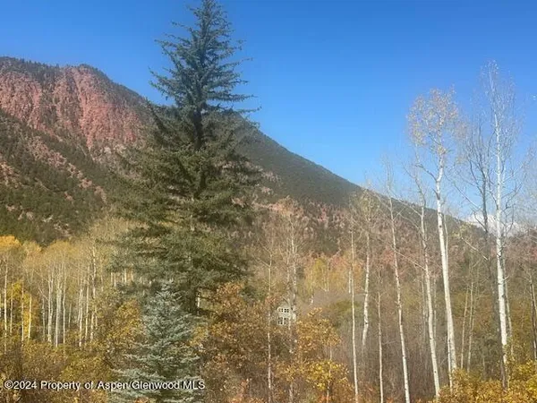 a view of mountain view with mountains in the background