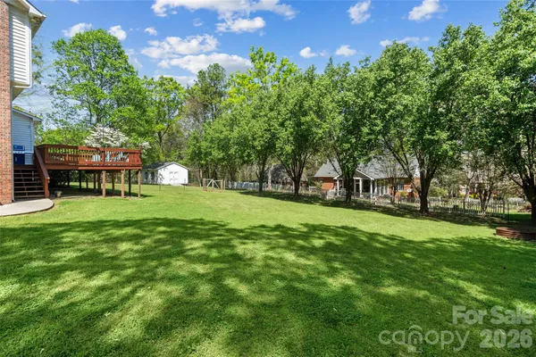 a view of a house with a big yard