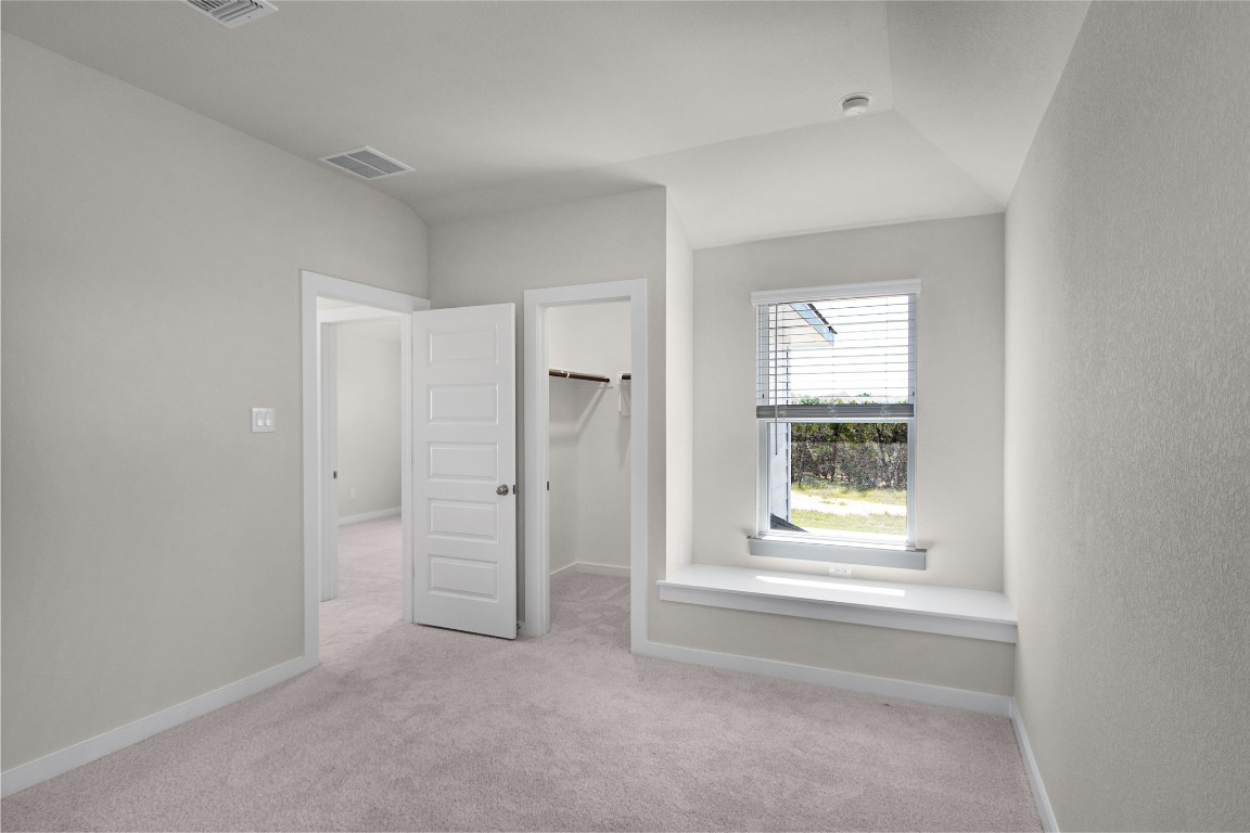 405 Raleigh Drive Georgetown, TX 78633 - Photo 34 of 36 an empty room with windows and closet