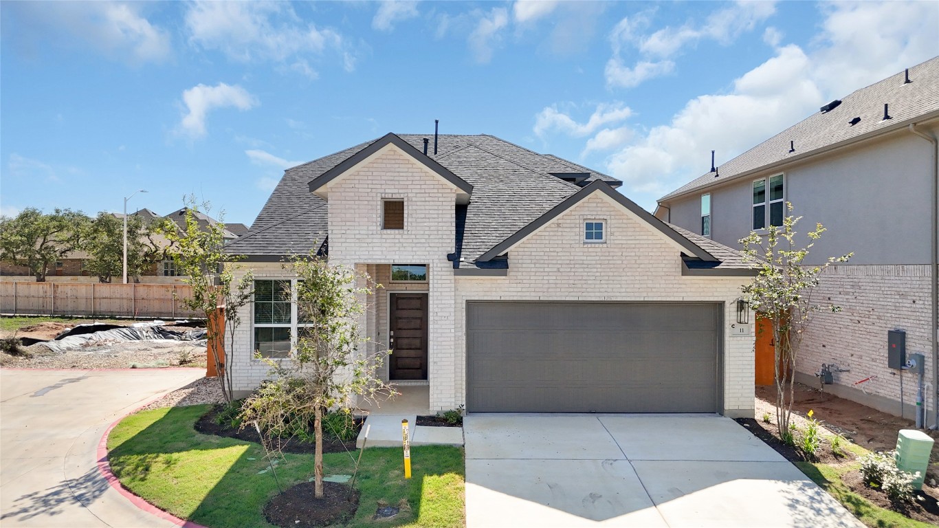 405 Raleigh Drive Georgetown, TX 78633 - Photo 16 of 36 a view of a house with a yard and potted plants