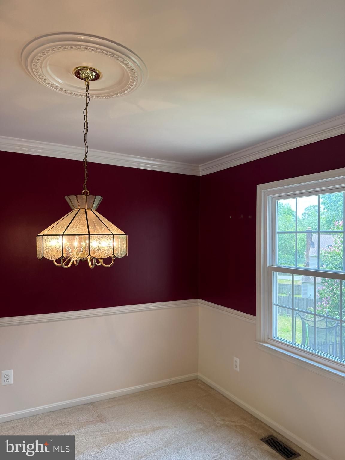 11724 Roosevelt Road Fredericksburg, VA 22407 - Photo 14 of 20 a view of a room with a chandelier fan and windows
