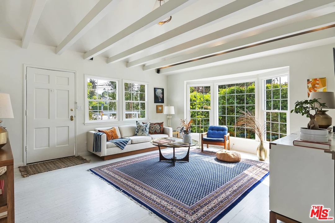 2801 West Silver Drive Los Angeles, CA 90039 - Photo 1 of 34 a living room with furniture and a large window