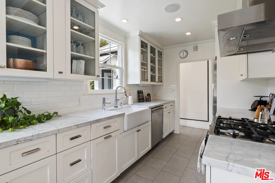2801 West Silver Drive Los Angeles, CA 90039 - Photo 11 of 34 a kitchen with a sink and refrigerator