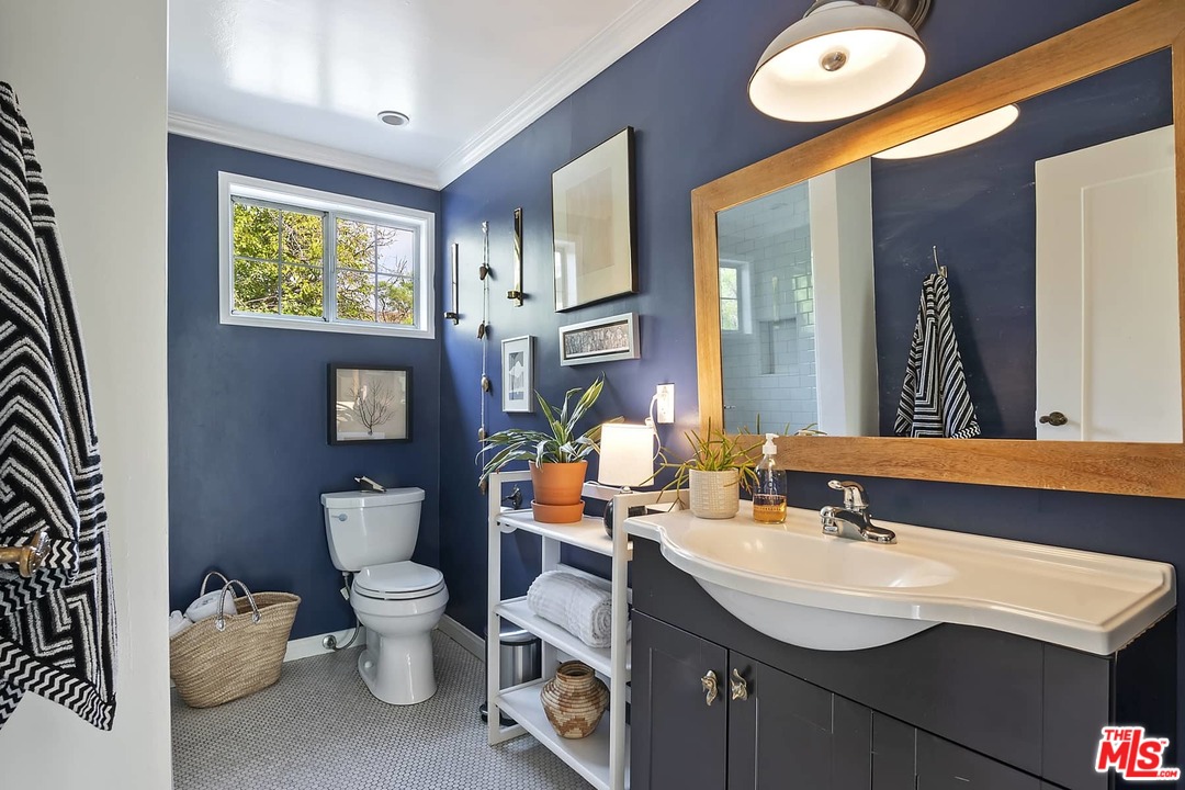 2801 West Silver Drive Los Angeles, CA 90039 - Photo 16 of 34 a bathroom with a sink and a mirror