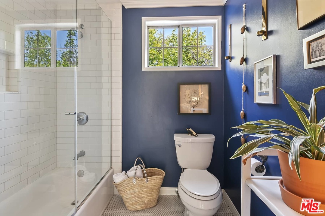 2801 West Silver Drive Los Angeles, CA 90039 - Photo 17 of 34 a bathroom with a toilet a sink and a shower