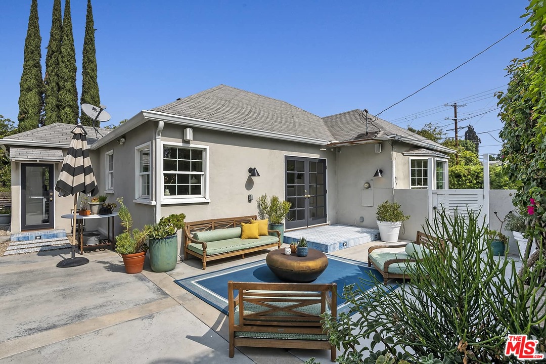 2801 West Silver Drive Los Angeles, CA 90039 - Photo 22 of 34 a view of a house with backyard and sitting area