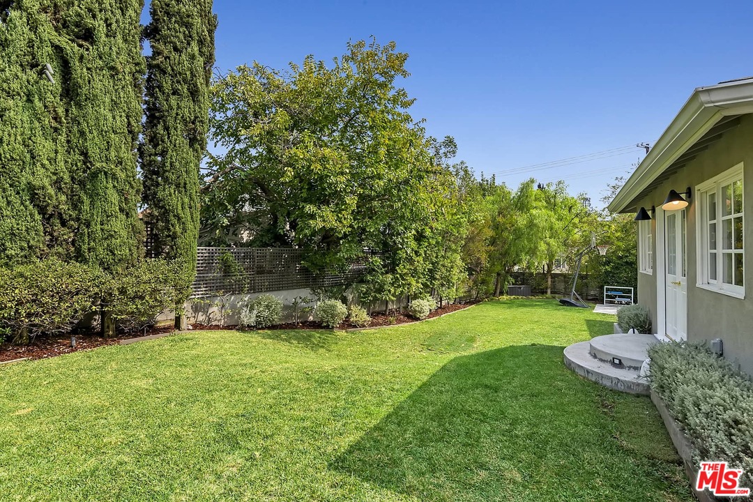 2801 West Silver Drive Los Angeles, CA 90039 - Photo 25 of 34 a view of a backyard with a garden