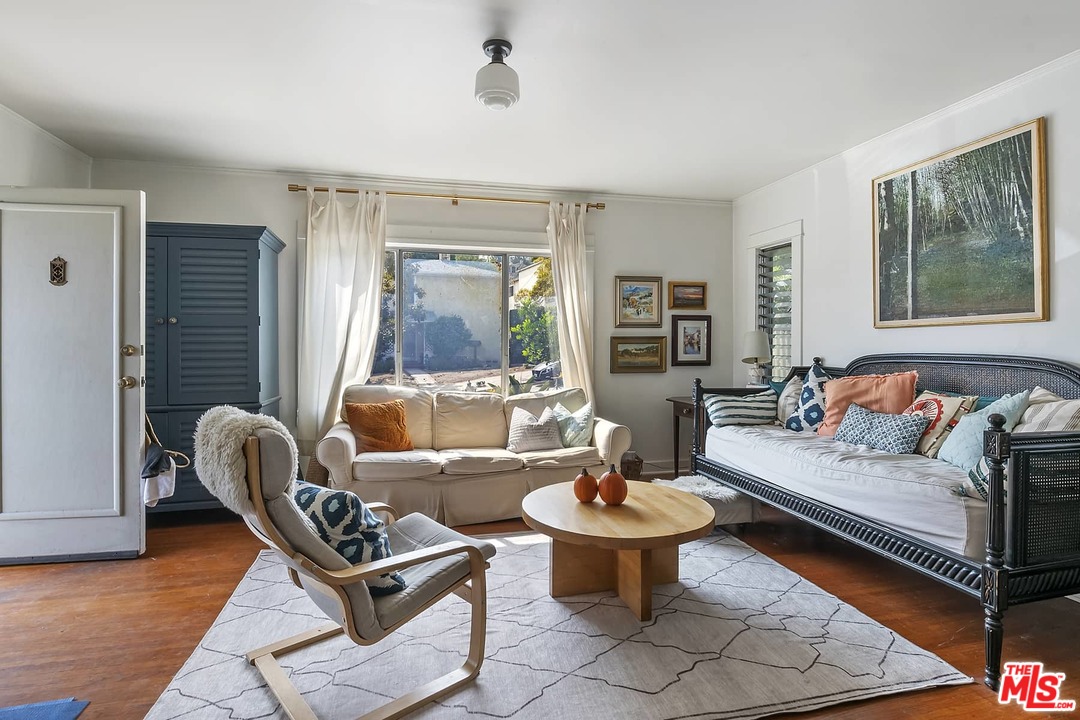 2801 West Silver Drive Los Angeles, CA 90039 - Photo 33 of 34 a living room with furniture and a window