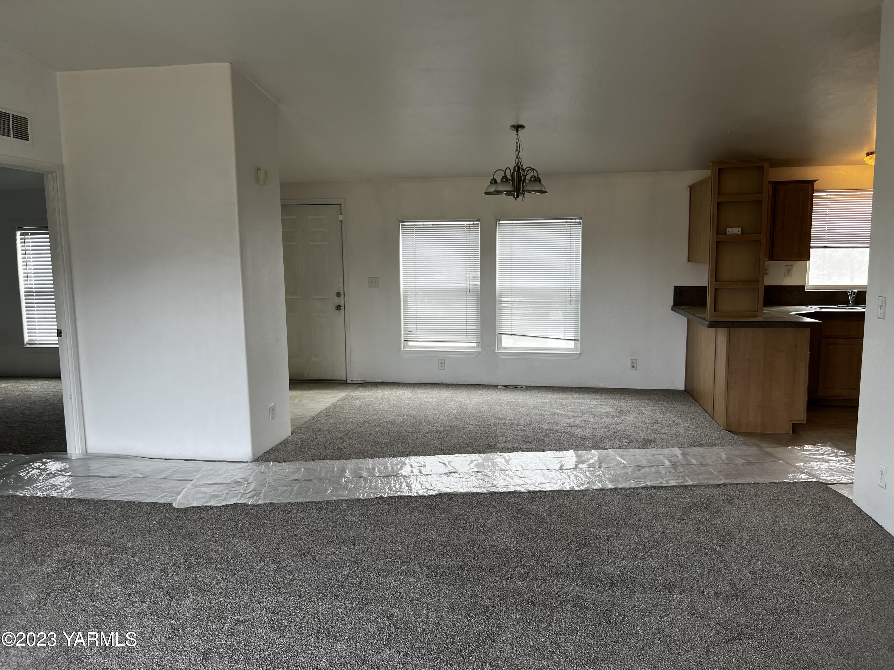 12102 North Hinzerling Road Prosser, WA 99350 - Photo 12 of 43 a view of an empty room with a window