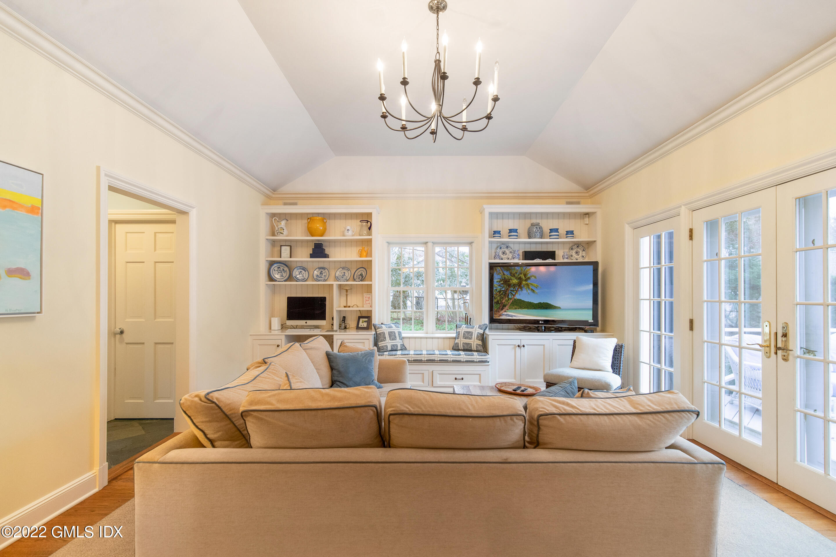 32 Alpine Road Greenwich, CT 06830 - Photo 11 of 17 a living room with fireplace furniture and a flat screen tv