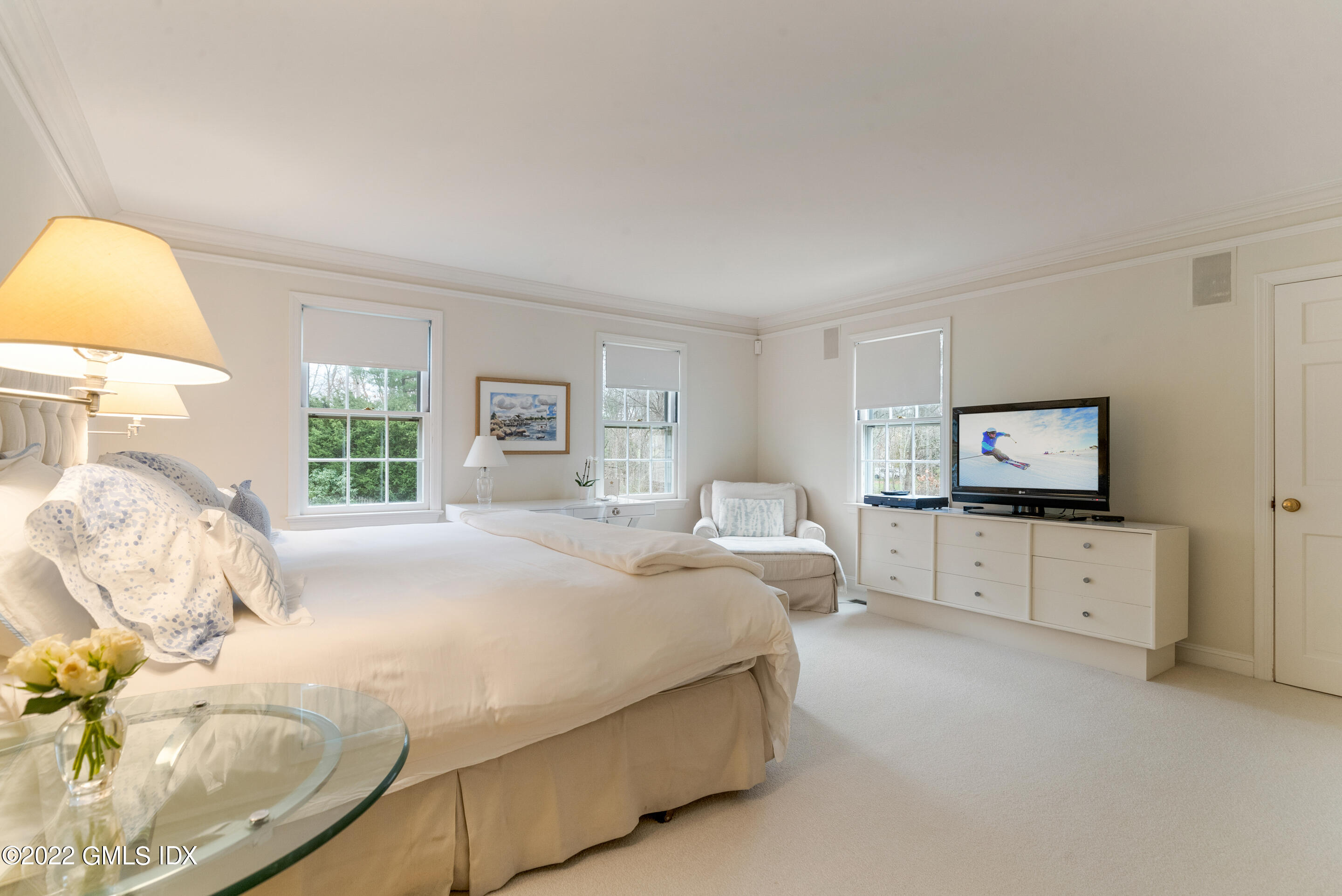 32 Alpine Road Greenwich, CT 06830 - Photo 14 of 17 a bedroom with a bed and a flat screen tv