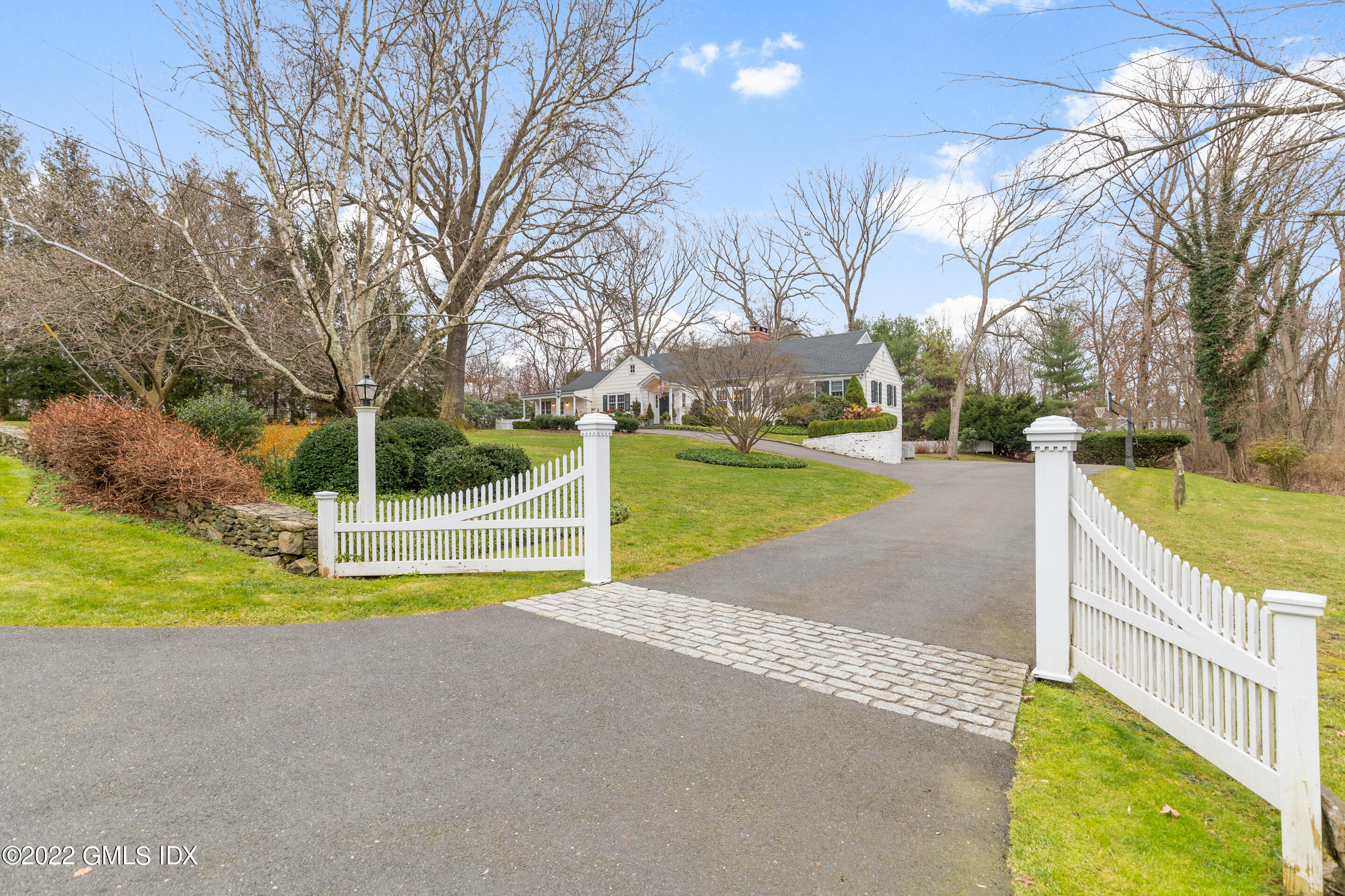 32 Alpine Road Greenwich, CT 06830 - Photo 17 of 17 a view of a swimming pool with a patio