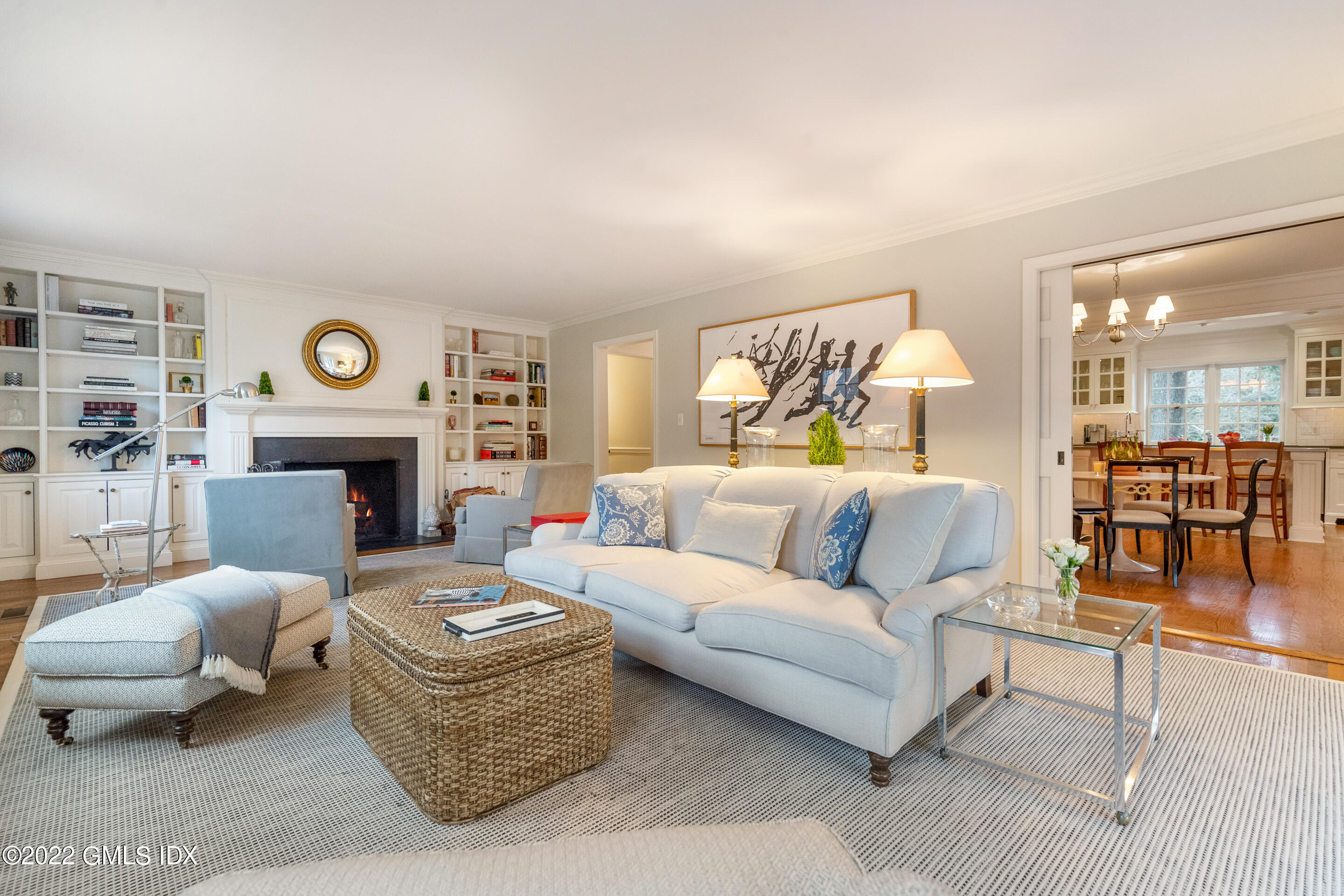 32 Alpine Road Greenwich, CT 06830 - Photo 7 of 17 a living room with furniture a fireplace and a table