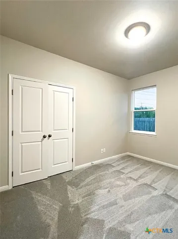 a bathroom with a bathtub and a toilet