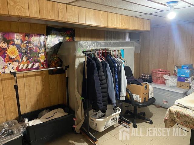 739 Ridgedale Avenue Woodbridge, NJ 07095 - Photo 9 of 10 a view of walk in closet with clothes and shoes