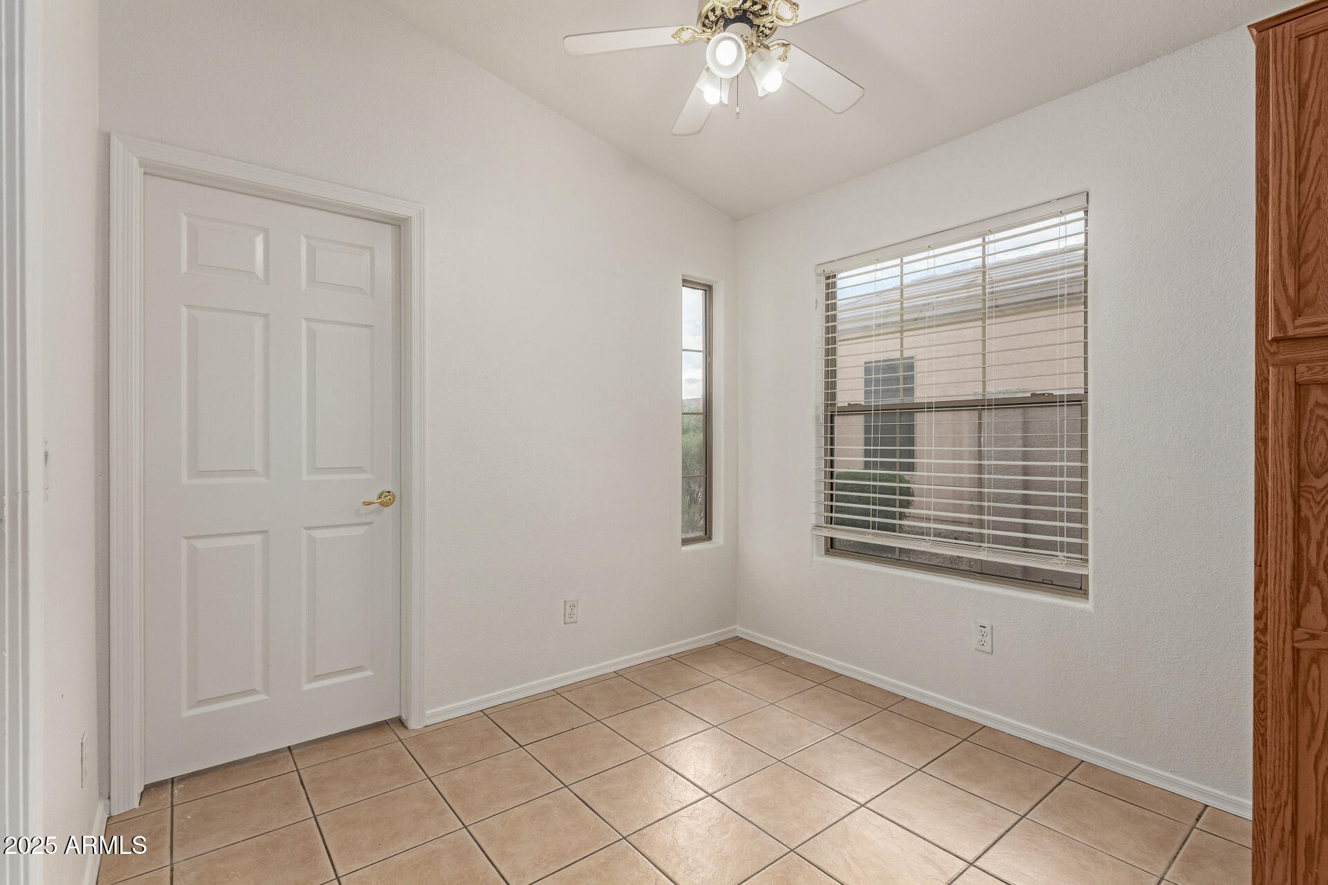 17573 West Dalea Drive Goodyear, AZ 85338 - Photo 13 of 29 a view of an empty room with a window