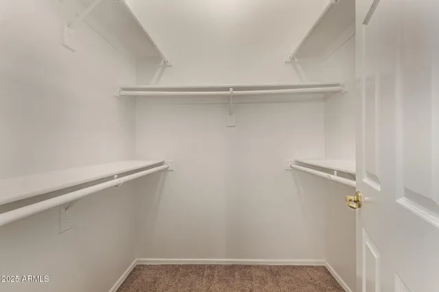 a view of small space with racks on the wall