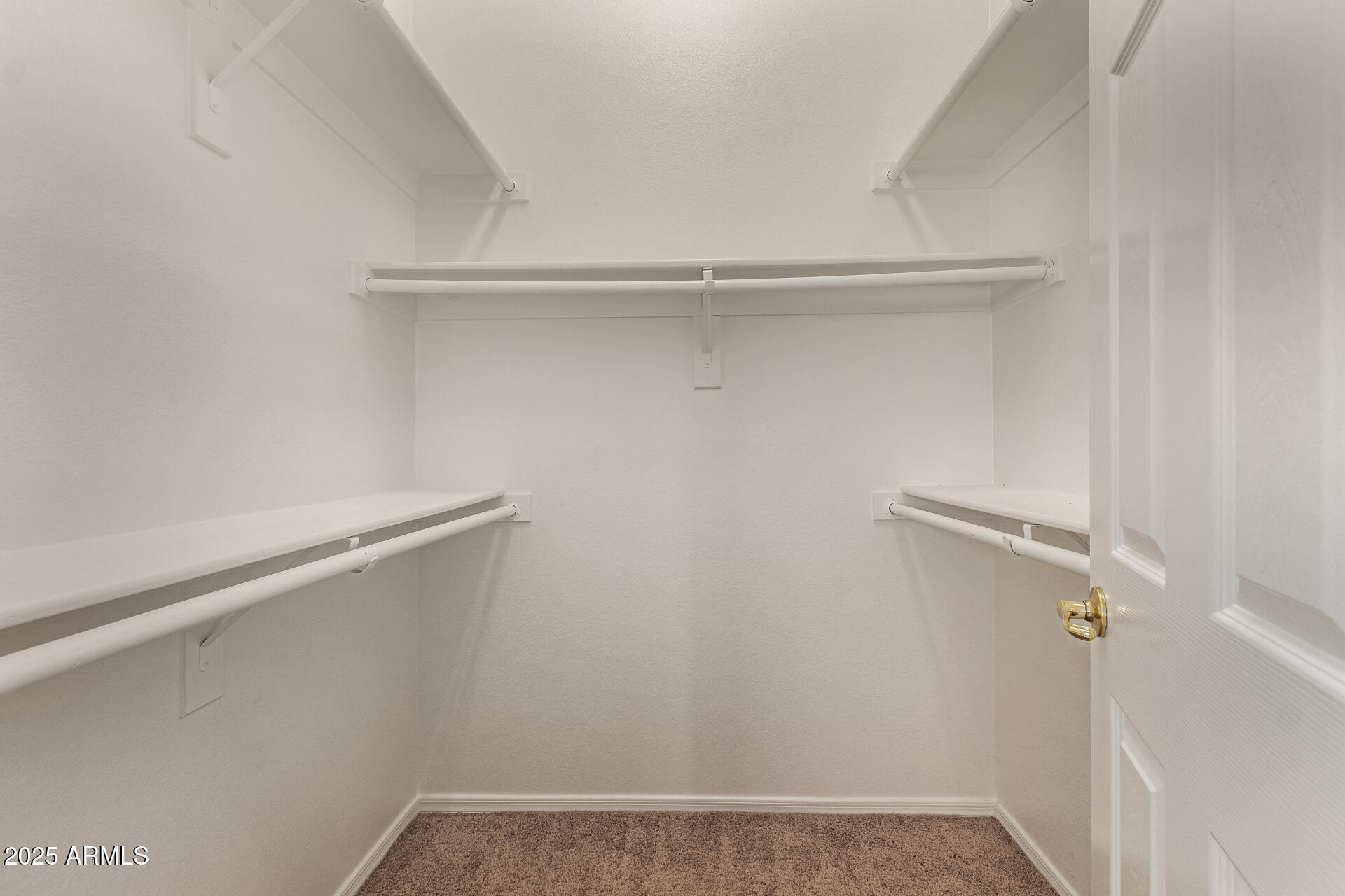 17573 West Dalea Drive Goodyear, AZ 85338 - Photo 19 of 29 a view of small space with racks on the wall