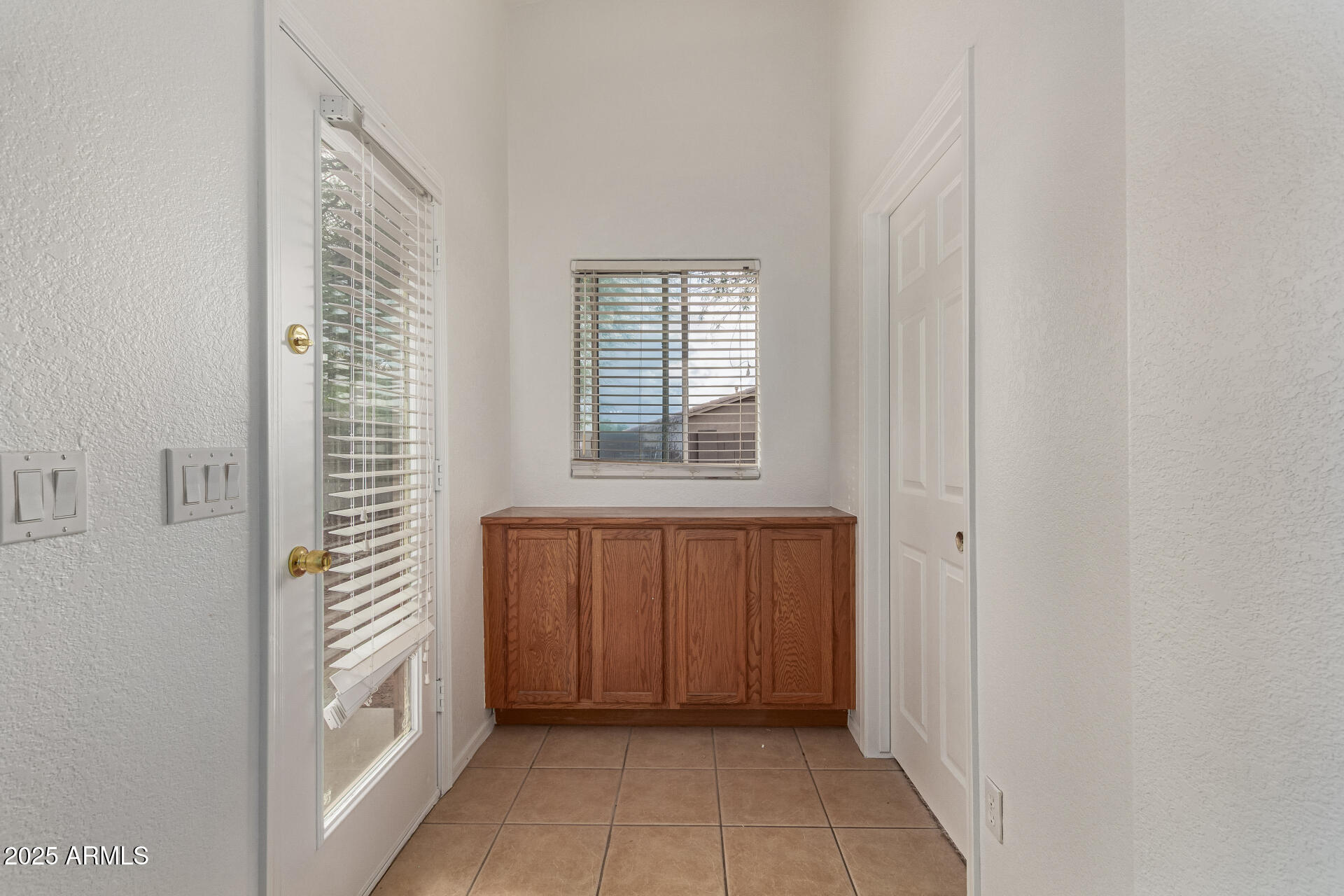 17573 West Dalea Drive Goodyear, AZ 85338 - Photo 25 of 29 a view of front door with cabinets