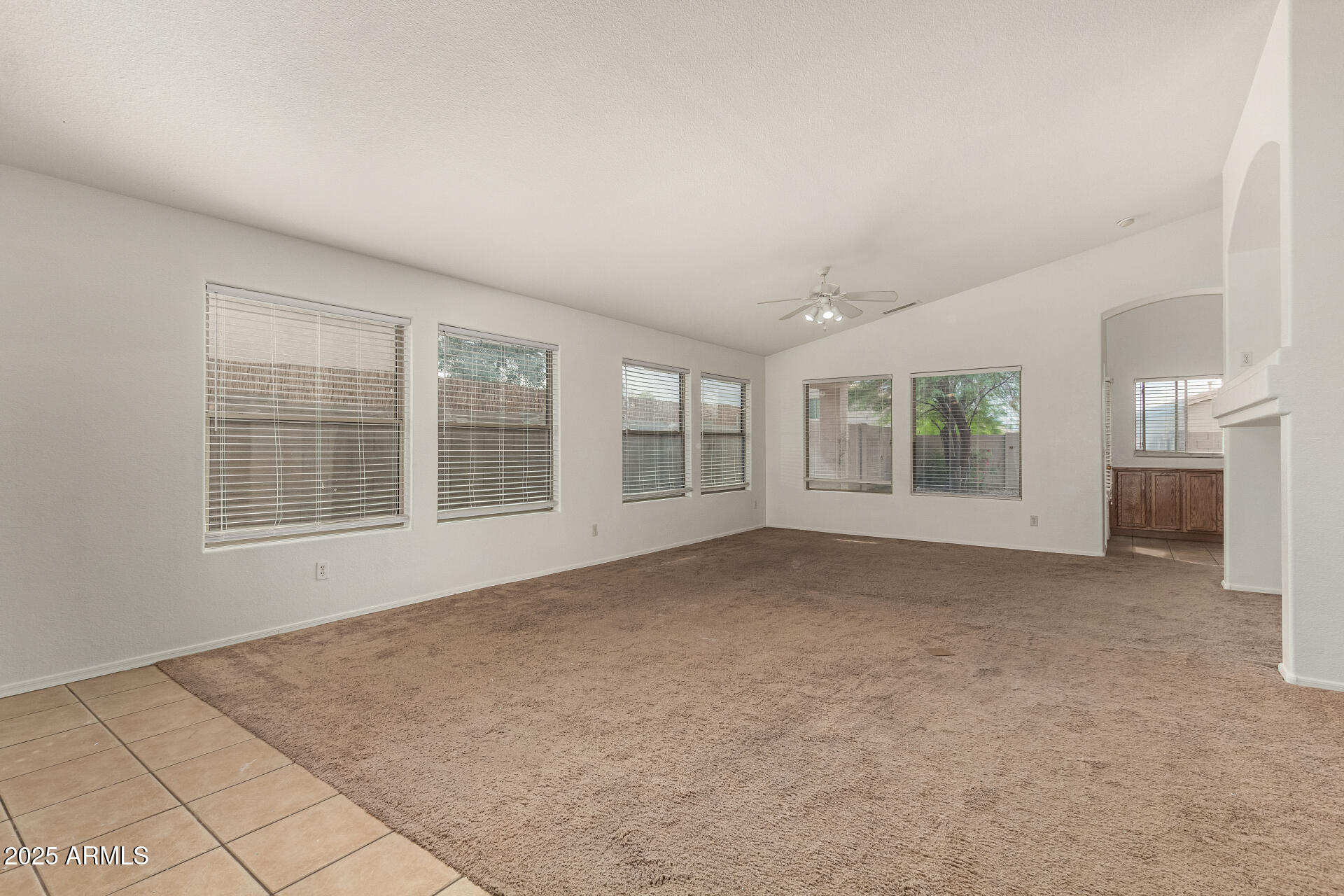 17573 West Dalea Drive Goodyear, AZ 85338 - Photo 5 of 29 a view of an empty room with a window