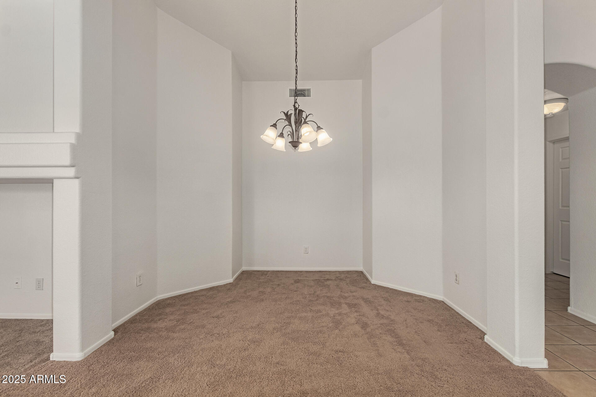 17573 West Dalea Drive Goodyear, AZ 85338 - Photo 7 of 29 a view of a chandelier in big room and chandelier