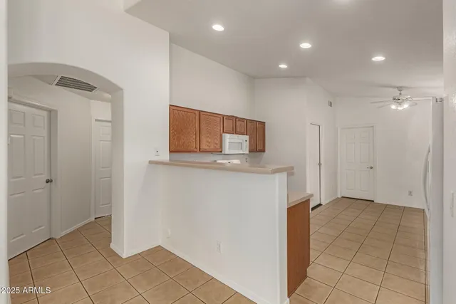 a view of a hallway with closet area