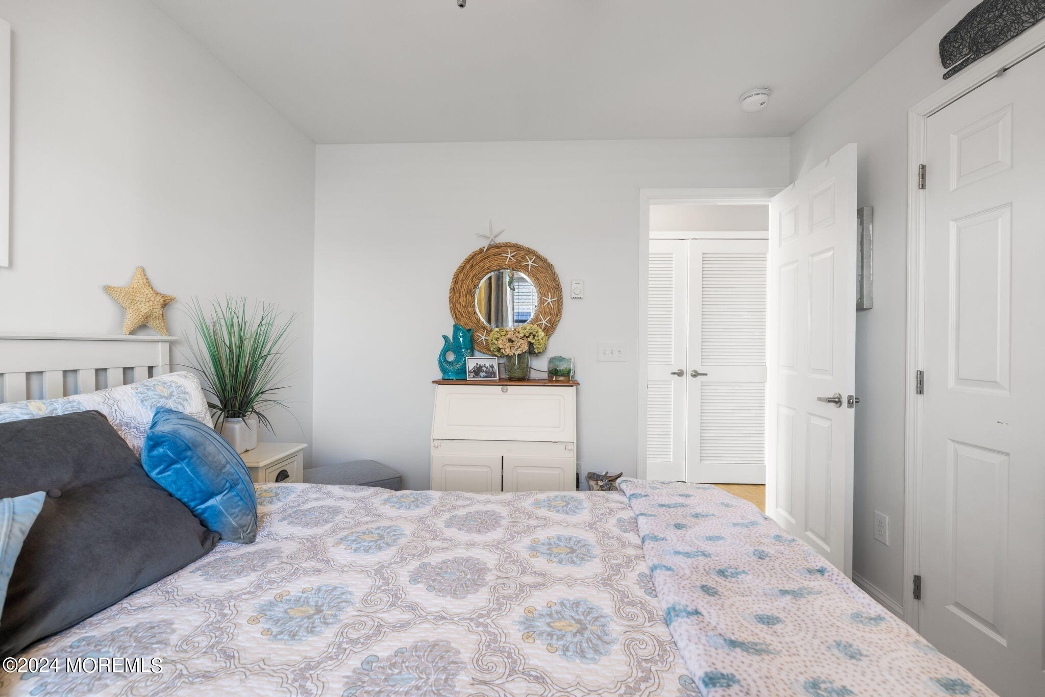 61 Rona Lane Beach Haven West, NJ 08050 - Photo 18 of 63 a bedroom with a bed and a dresser