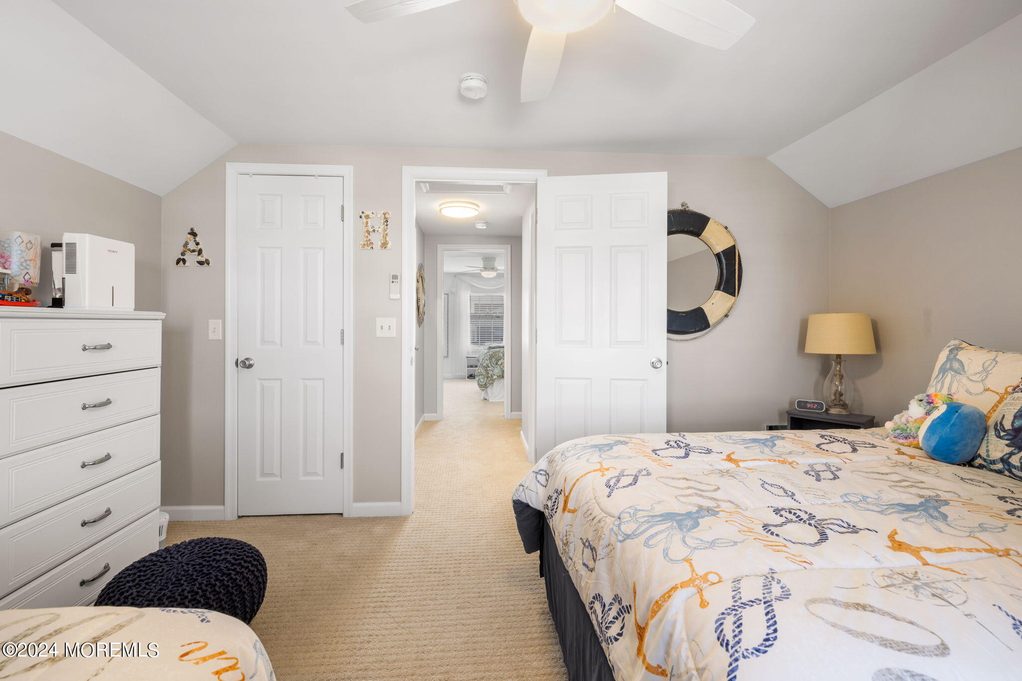 61 Rona Lane Beach Haven West, NJ 08050 - Photo 29 of 63 a bedroom with a bed and closet