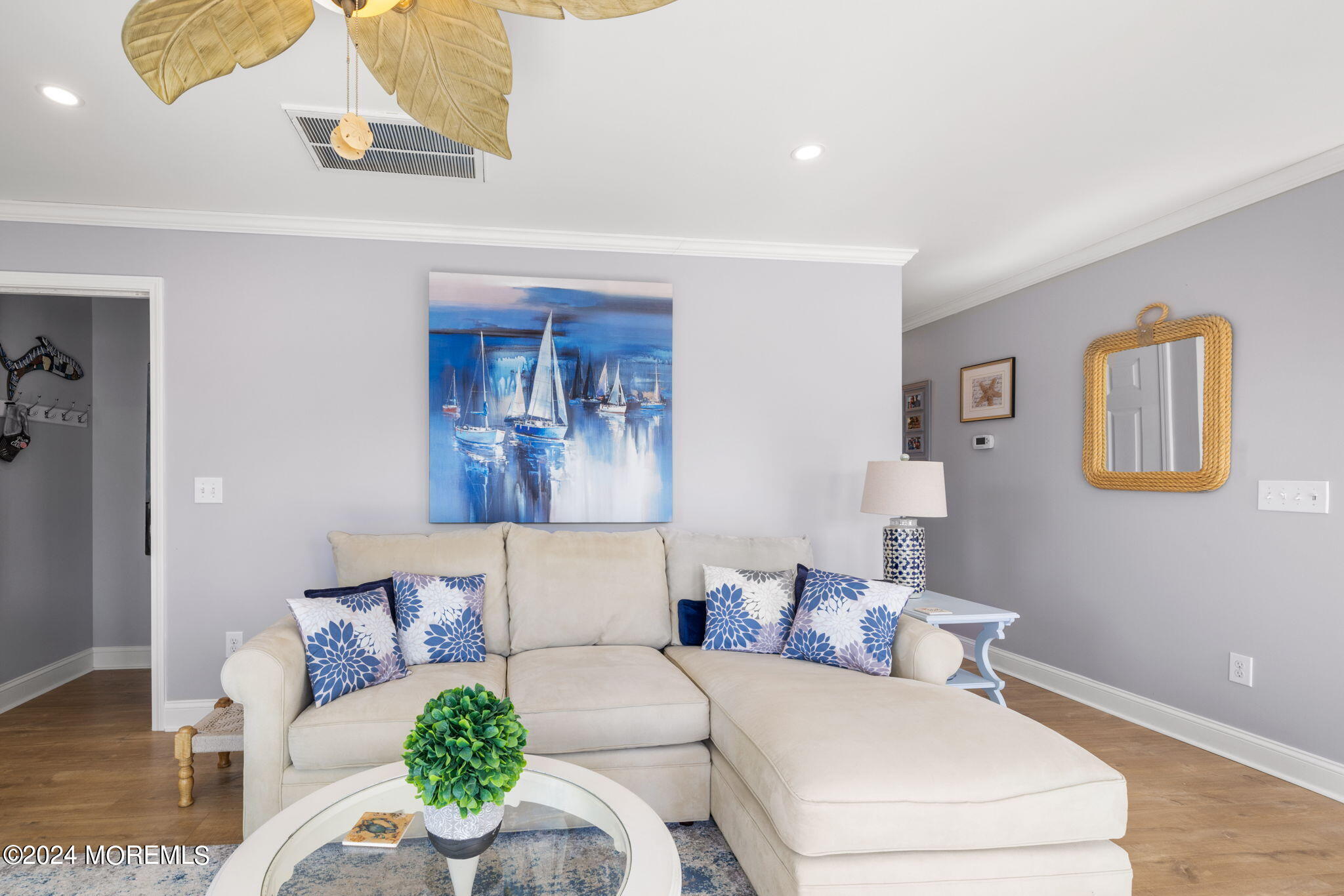 61 Rona Lane Beach Haven West, NJ 08050 - Photo 3 of 63 a living room with furniture and a couch