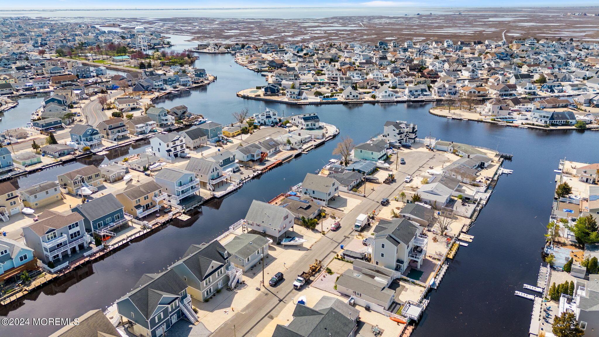 61 Rona Lane Beach Haven West, NJ 08050 - Photo 37 of 63 an aerial view of a city with ocean view
