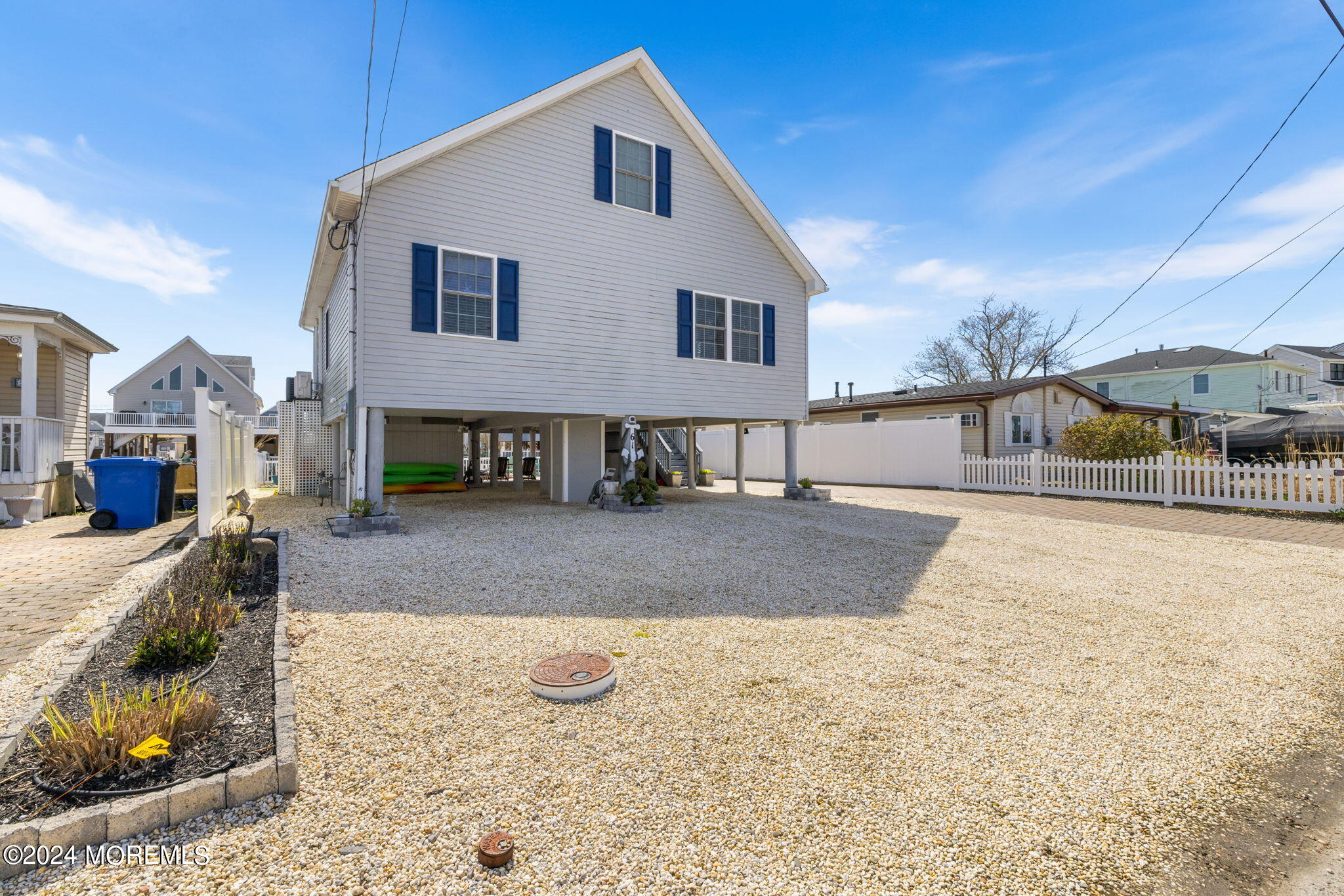 61 Rona Lane Beach Haven West, NJ 08050 - Photo 47 of 63 a view of a house with a yard