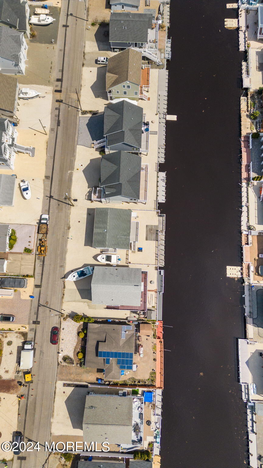 61 Rona Lane Beach Haven West, NJ 08050 - Photo 51 of 63 a picture of a bathroom with a sink and a mirror