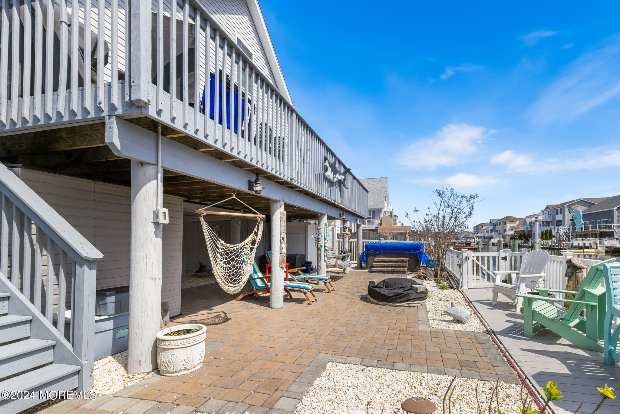 61 Rona Lane Beach Haven West, NJ 08050 - Photo 55 of 63 a roof deck with table and chairs