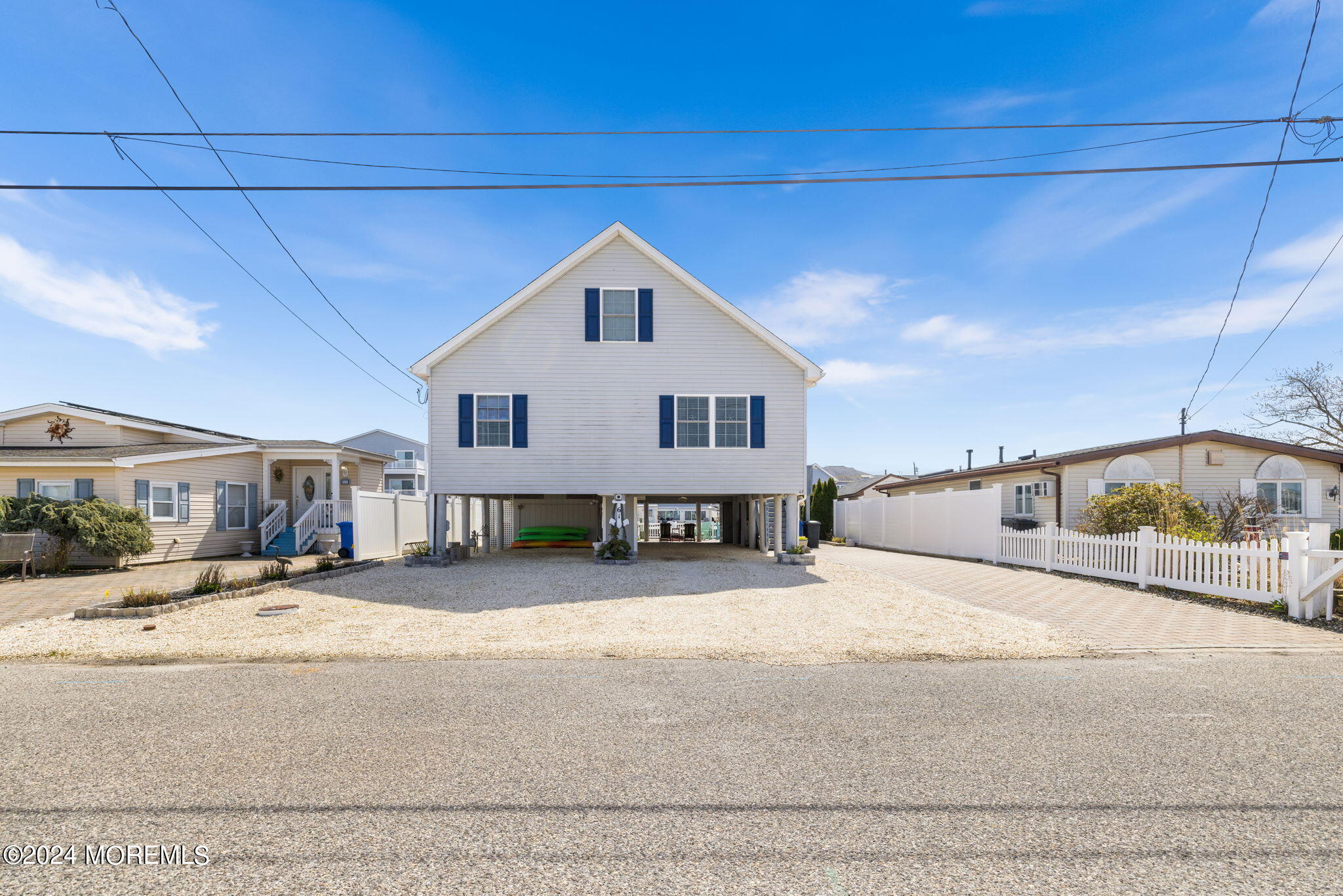 61 Rona Lane Beach Haven West, NJ 08050 - Photo 56 of 63 a view of a house with a patio