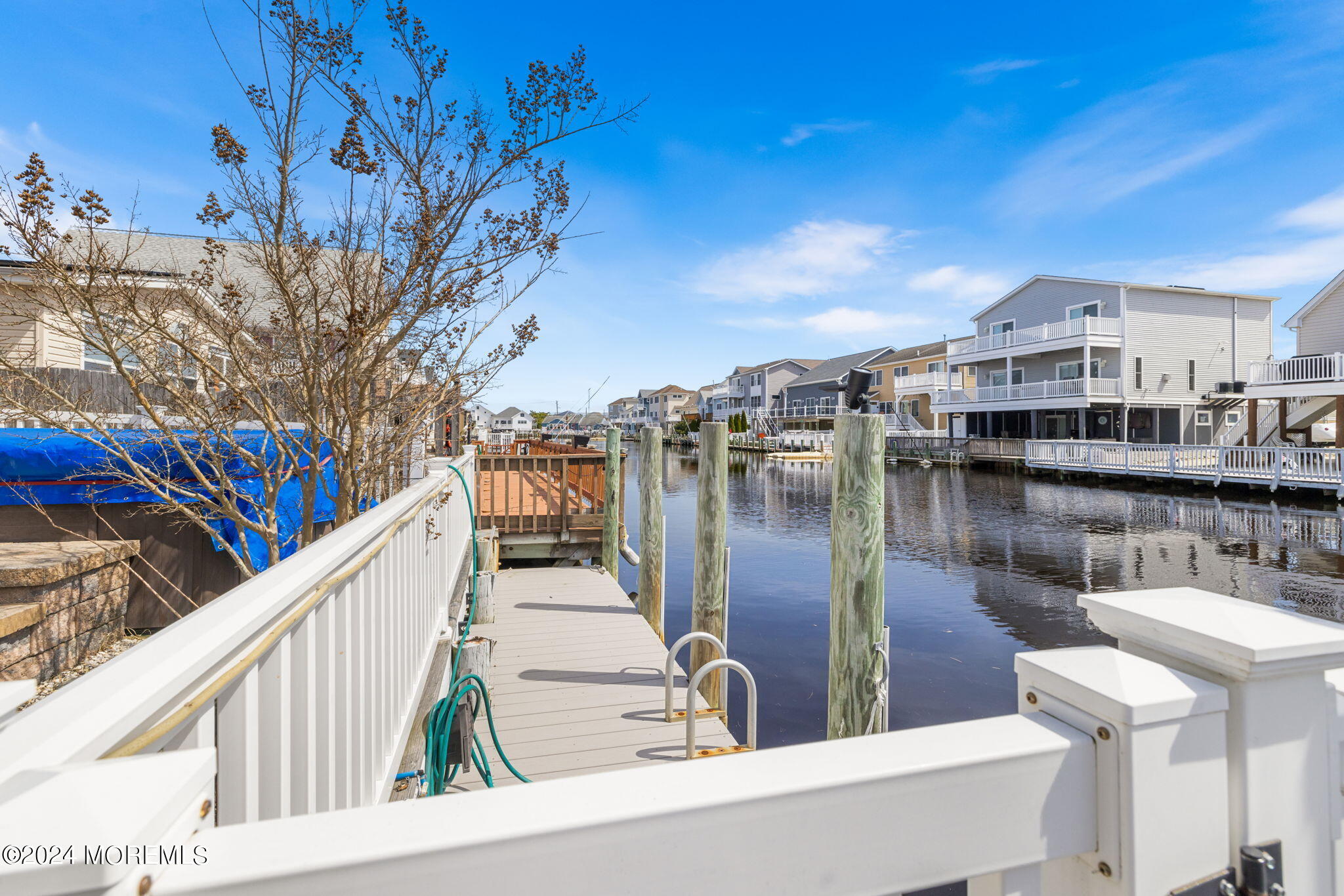 61 Rona Lane Beach Haven West, NJ 08050 - Photo 60 of 63 a view of a lake with a house