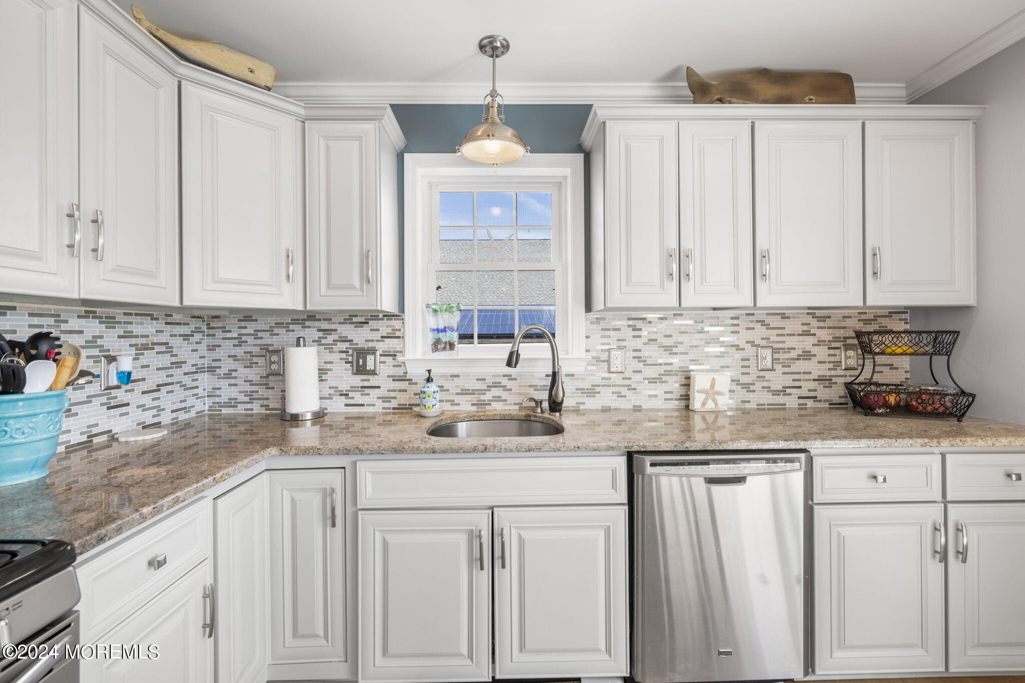 61 Rona Lane Beach Haven West, NJ 08050 - Photo 7 of 63 a kitchen with granite countertop white cabinets and white appliances