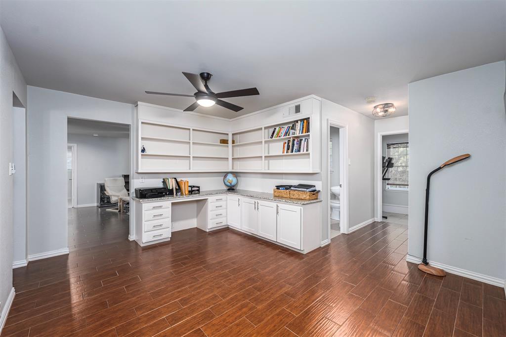 6512 Greenway Road Fort Worth, TX 76116 - Photo 19 of 38 Unfurnished office with built in study area, a ceiling fan, and wood finish floors