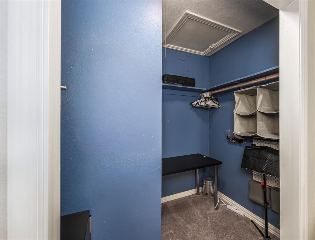 6512 Greenway Road Fort Worth, TX 76116 - Photo 24 of 38 Spacious closet with dark carpet