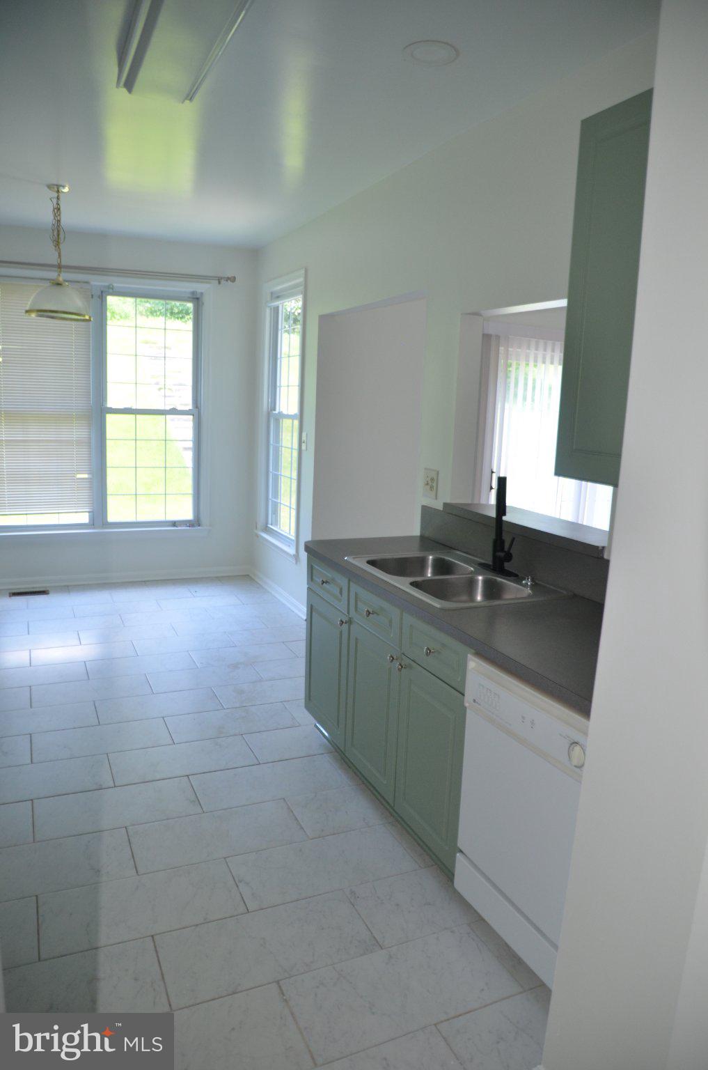 406 Longdraft Road Gaithersburg, MD 20878 - Photo 15 of 24 Bright and airy kitchen space.