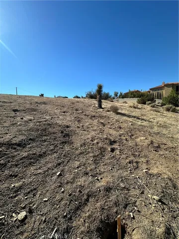 a view of ocean and a mountain