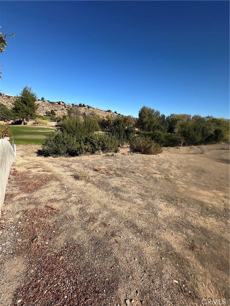 18132 Bangor Avenue Hesperia, CA 92345 - Photo 3 of 15 a view of lake with mountain