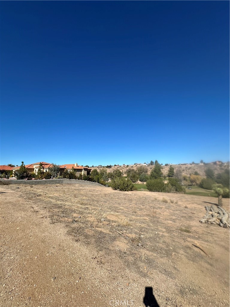 18132 Bangor Avenue Hesperia, CA 92345 - Photo 6 of 15 a view of ocean with green space