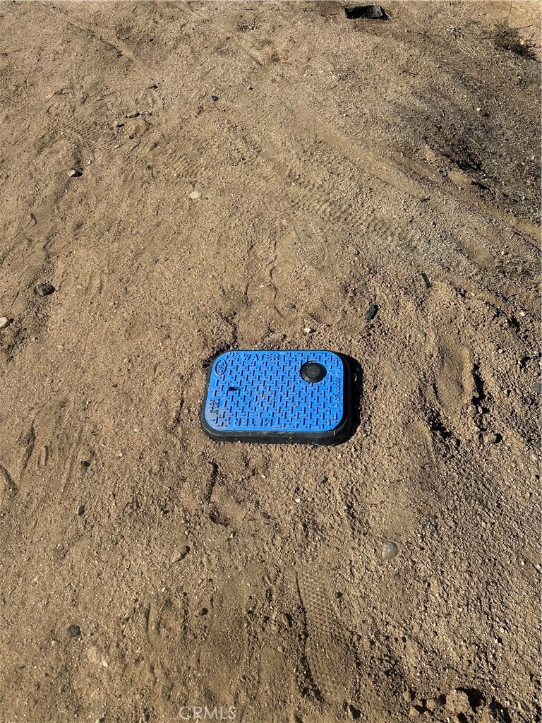 18132 Bangor Avenue Hesperia, CA 92345 - Photo 7 of 15 a picture of a bathroom with a sink