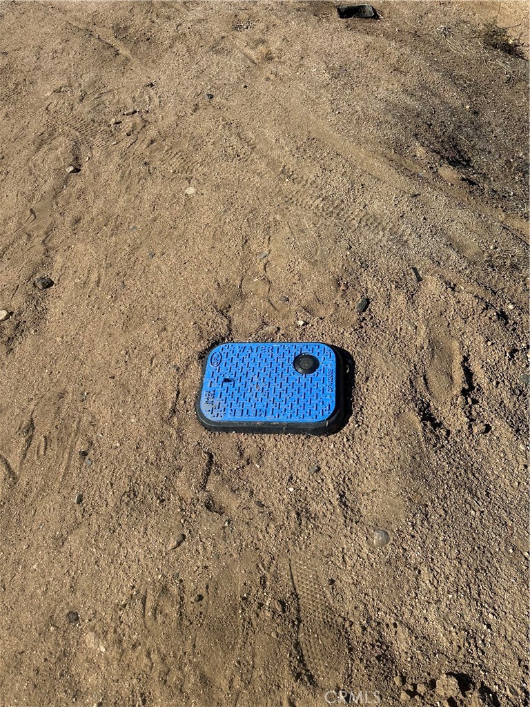 18132 Bangor Avenue Hesperia, CA 92345 - Photo 8 of 15 a picture of a bathroom with a sink