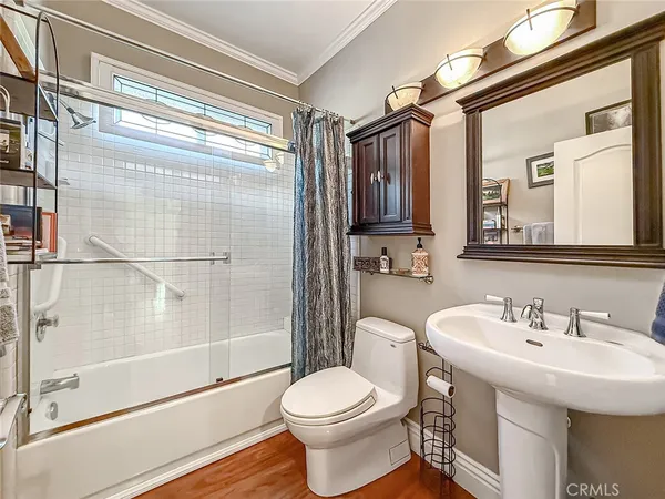 a view of a storage and utility room with racks on the wall