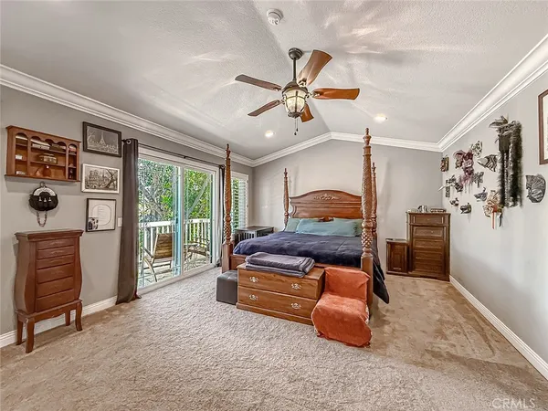 a kitchen with stainless steel appliances granite countertop a sink a stove and a wooden floors