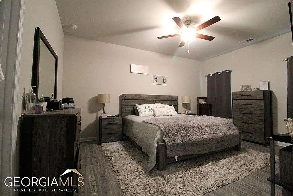 6 Gala Drive Northeast Rome, GA 30165 - Photo 5 of 11 a bedroom with a bed and dresser
